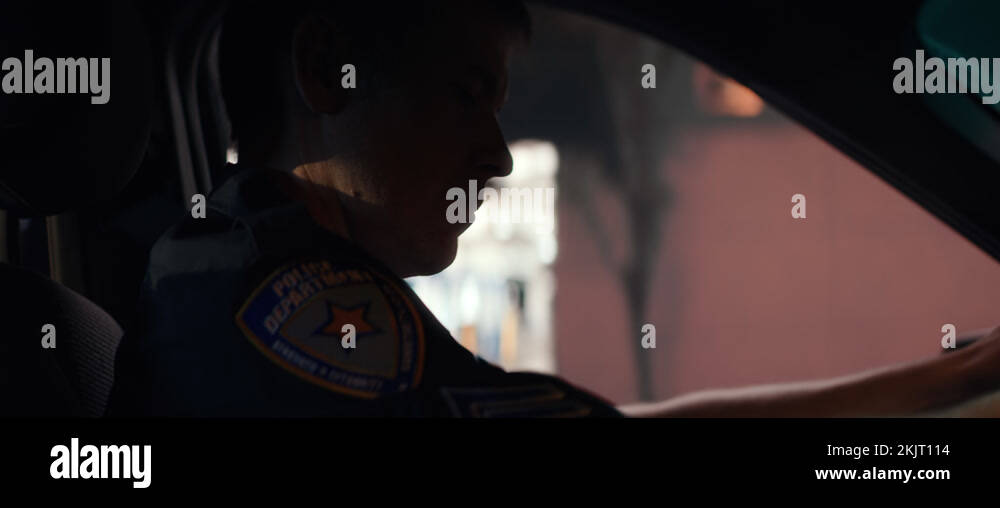 CU Police officer talking on CB radio while driving police vehicle at