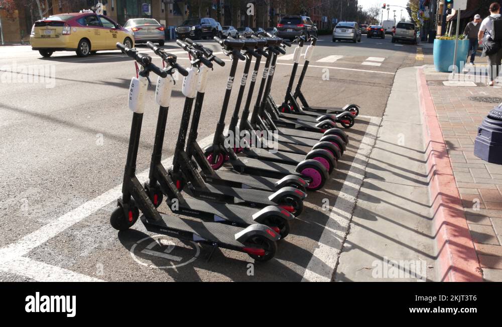 SAN DIEGO, CALIFORNIA USA 4 JAN 2020 Row of ride sharing electric