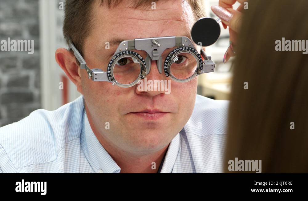 Optometrist choosing eye test lenses Stock Videos & Footage HD and 4K Video Clips Alamy