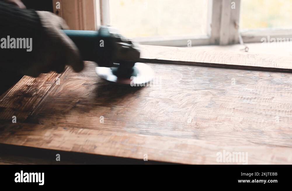 polishing of an old antique wooden door with a grinder, restoration furniture Stock Video