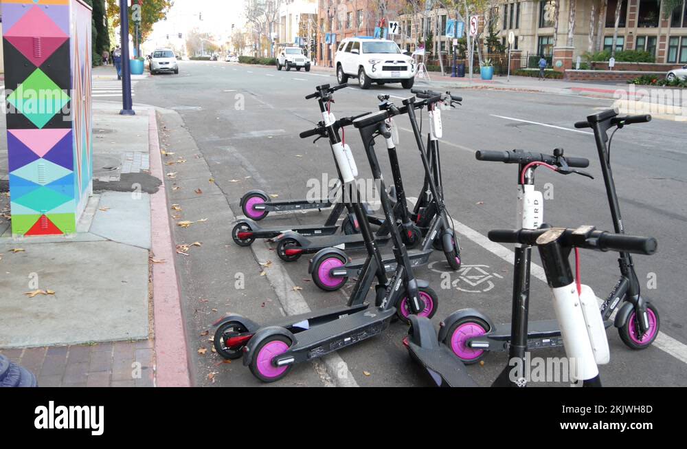 SAN DIEGO, CALIFORNIA USA 4 JAN 2020 Row of ride sharing electric
