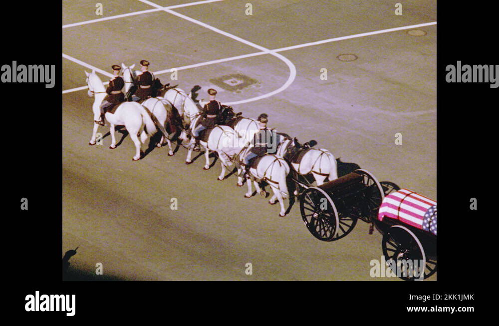 1960s Officers in uniform march in funeral procession for John F. Kennedy Stock Video Footage