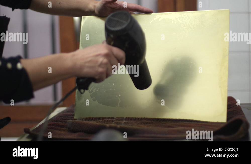 Drying process of the metal plate after all the waste is gone Stock