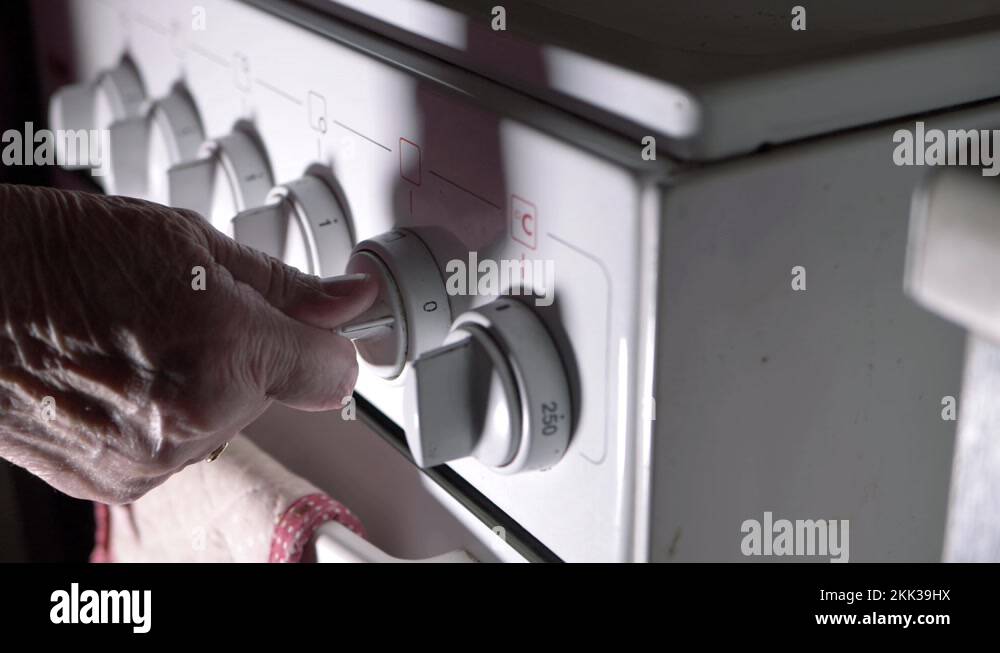 Elderly person cooking on gas stove Stock Videos & Footage HD and 4K