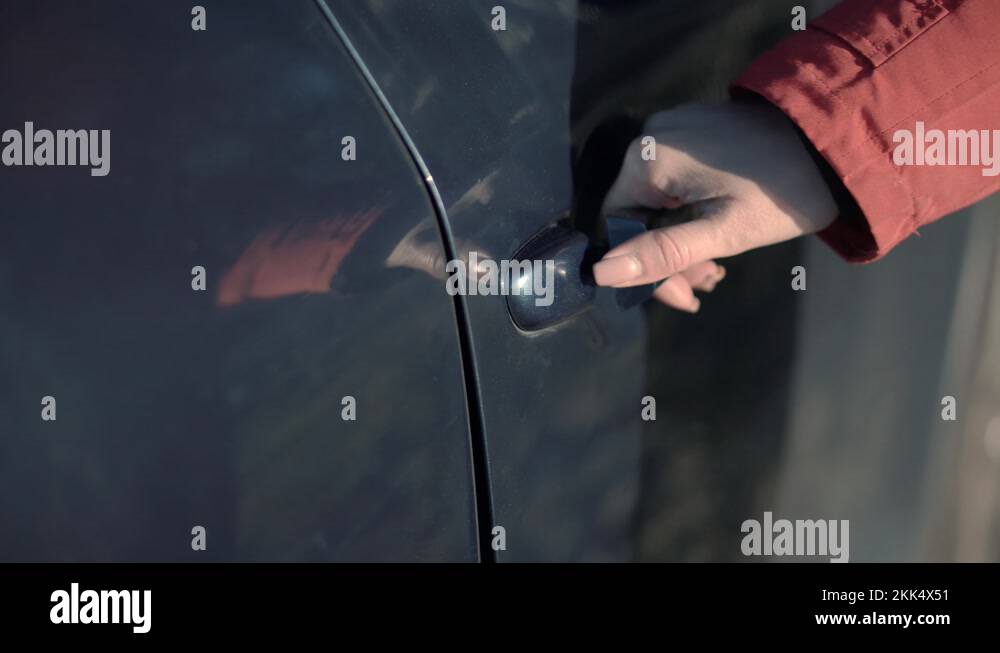 Woman Open Car Door.Woman Sit Inside Vehicle.Gets Into Luxury Car Stock