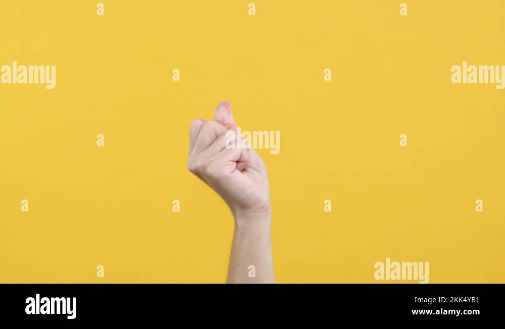 Close up of Man’s hand snapping his finger doing the hand gesture