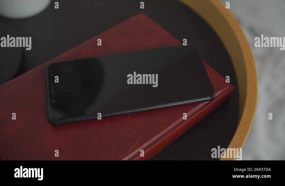 Female hand reaching phone to turn off alarm clock Stock Video Footage