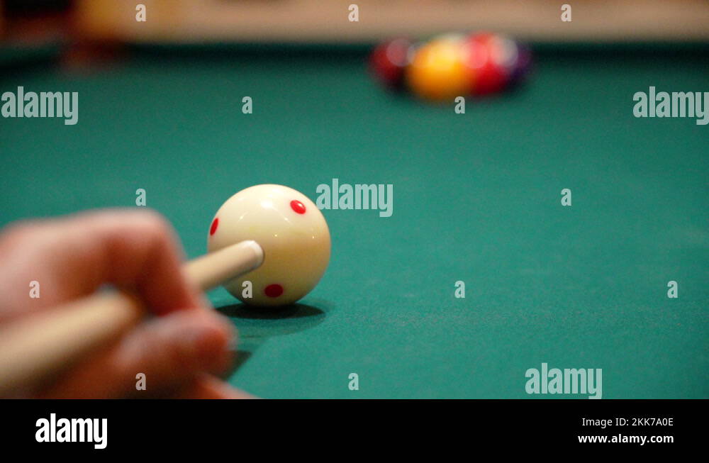 Slow Motion Billiards Low Angle Close Up of Cue Ball as Person Breaks a