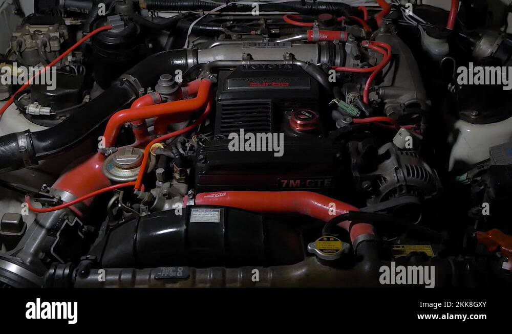 A 7M GTE engine seen in the engine bay of a MK3 Toyota Supra sports car