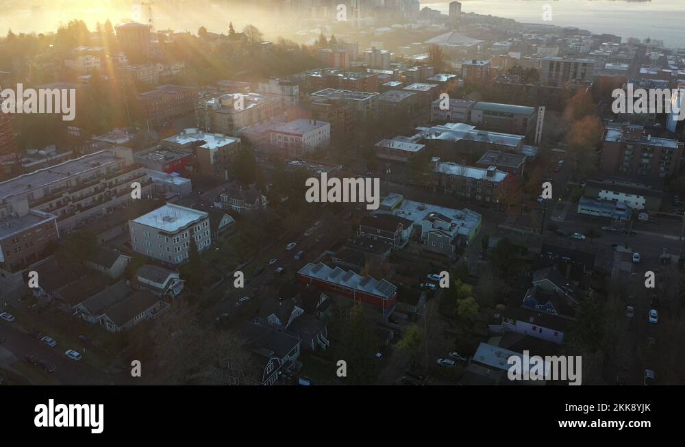 Cinematic sunrise drone reveal shot of Seattle from West Queen Anne