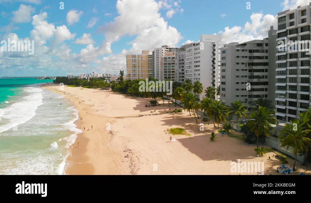 Sunny day at the beach Ocean Park, Puerto Rico Descending Stock Video
