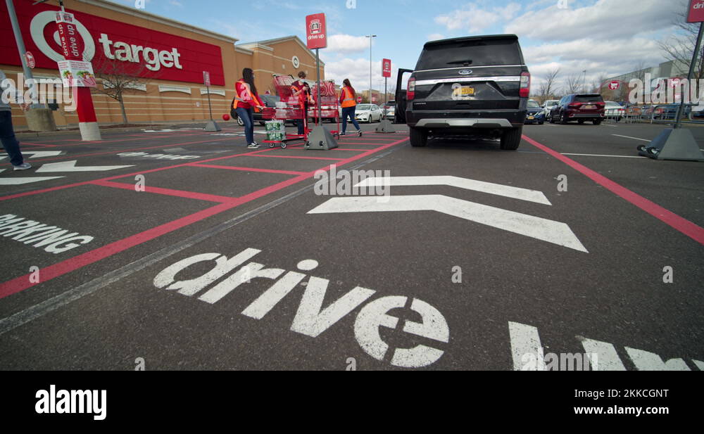 Target DRIVE UP Service. Employees bring shopping carts back to store