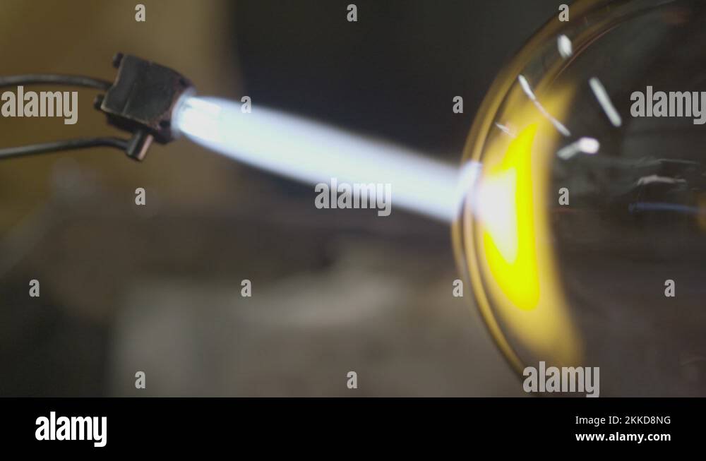 Closeup of Acetylene Torch Blowing Blown Glass with Flames and Heat