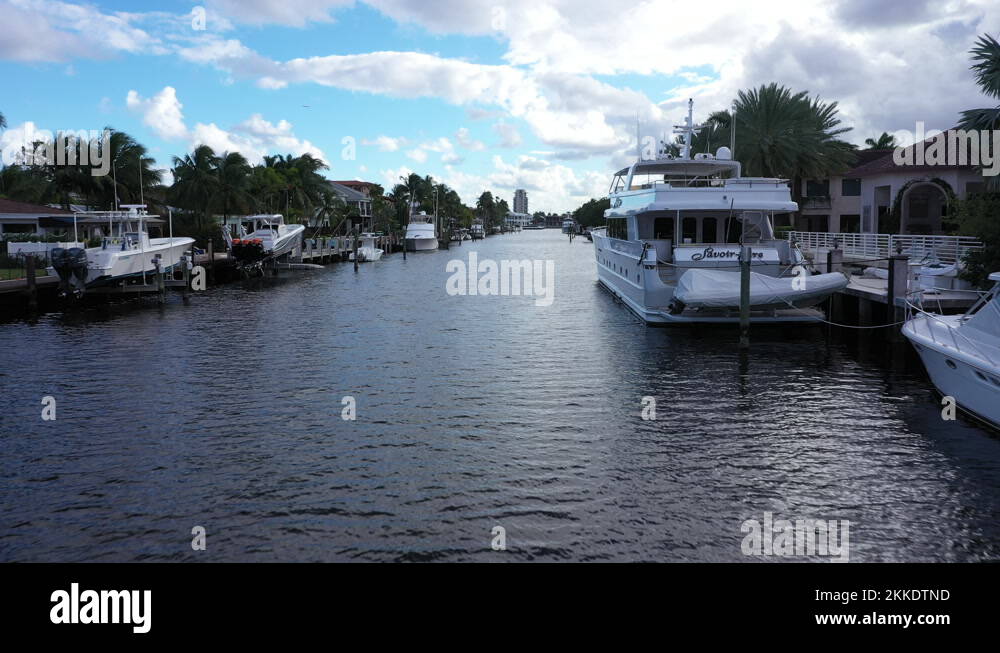 Yachts mooring in waterway of Fort Lauderdale, Florida moderate