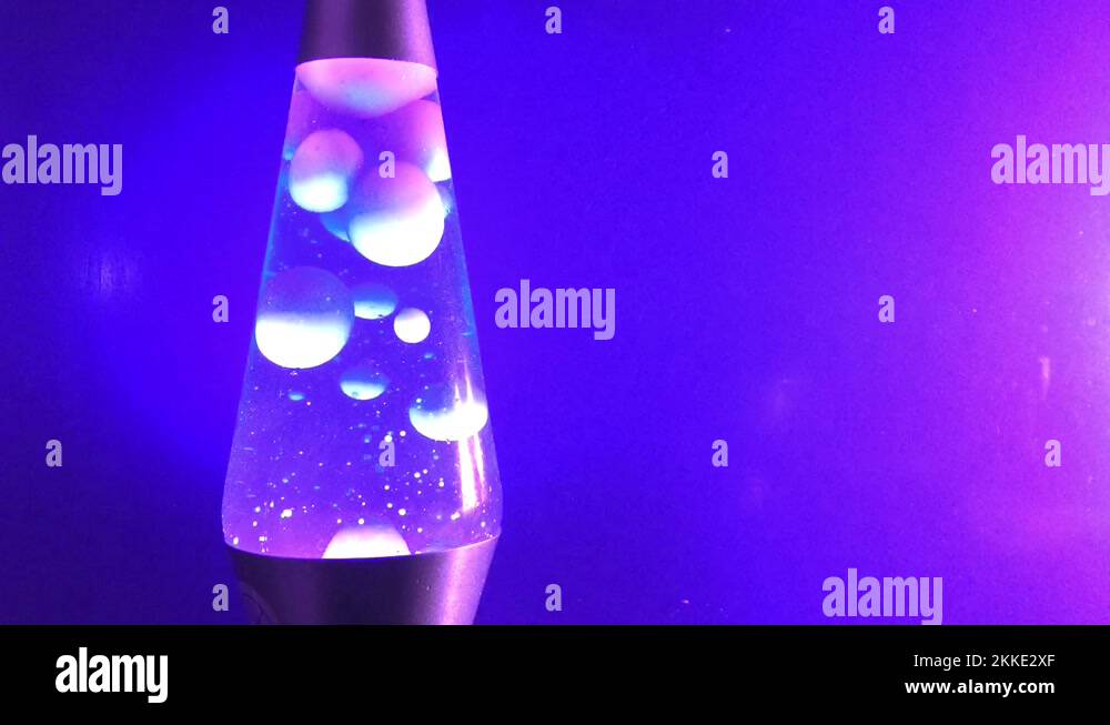 Lava lamp closeup 70s style violet purple lava lamp liquid background
