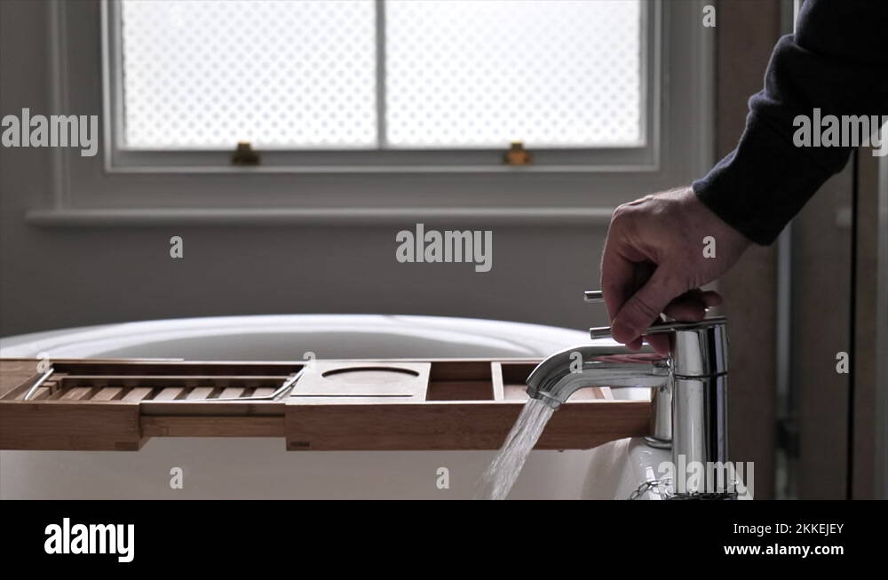 Man bath tap Stock Videos & Footage HD and 4K Video Clips Alamy