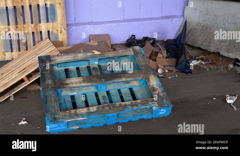 Trash in New York, Manhattan, Illegal dumped wood on side of road in