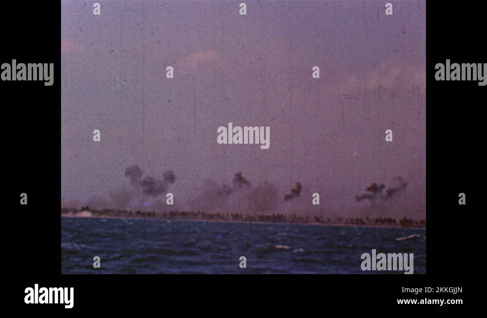 1940s Long shot of ship, guns firing. Shots from boat, explosions on