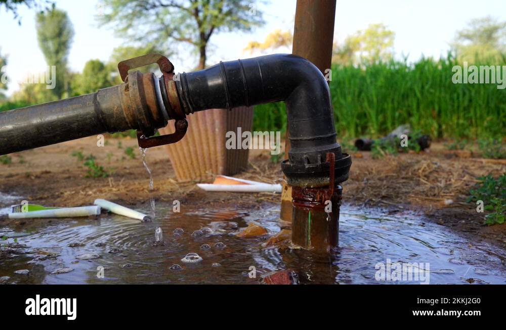 Save water concept. Water sipping from plastic water pipe. Water