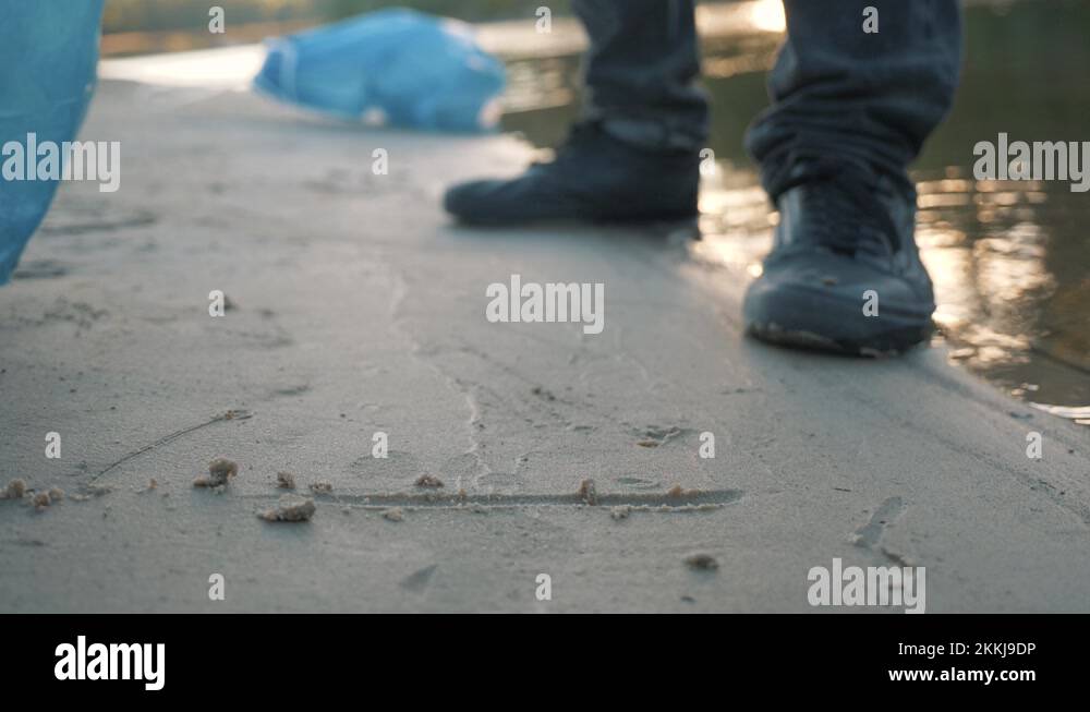 people on beach collects plastic trash,plastic bag.Water,beach