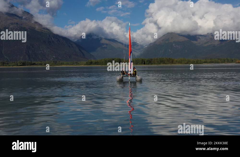 Front on view of two people sailing on their inflatable raft in the ...