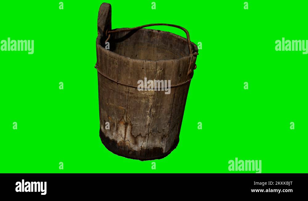 Old traditional wood bucket at green chromakey background Stock Video