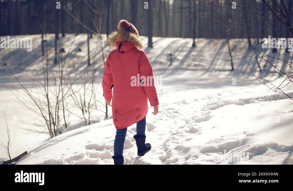 Footprints In Winter Boots Walking On Snow.Legs Walking In Snow At Cold Stock Video Footage Alamy