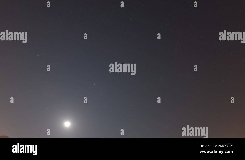 Bright moon light with twinkling n blinking stars on night sky Stock