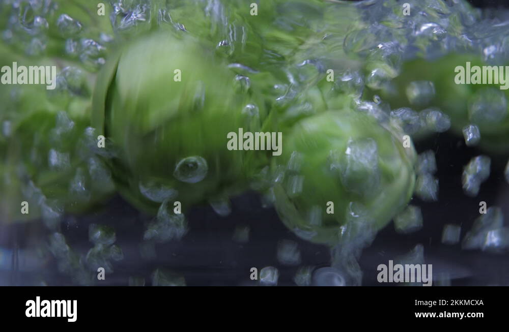 put brussels sprouts on boiling water pot 4k Stock Video Footage Alamy