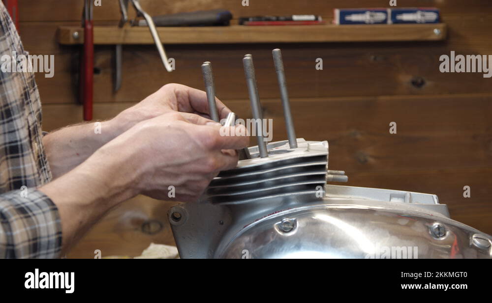 Motorcycle engine restoration and assemble after repair and rebuild in garage Stock Video