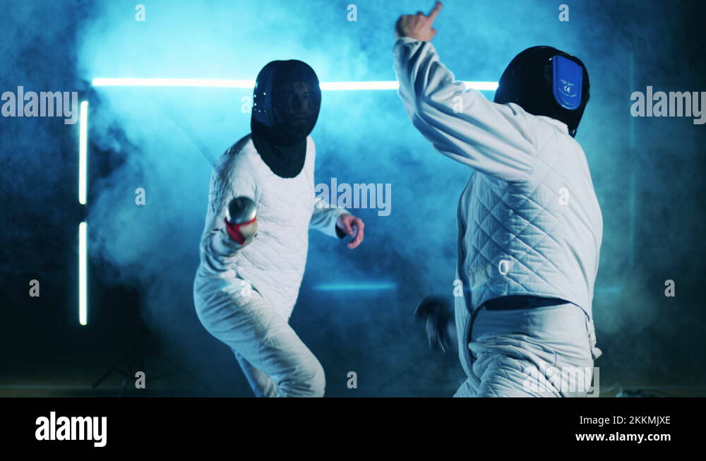 Male athletes are having a fencing training with foils Stock Video