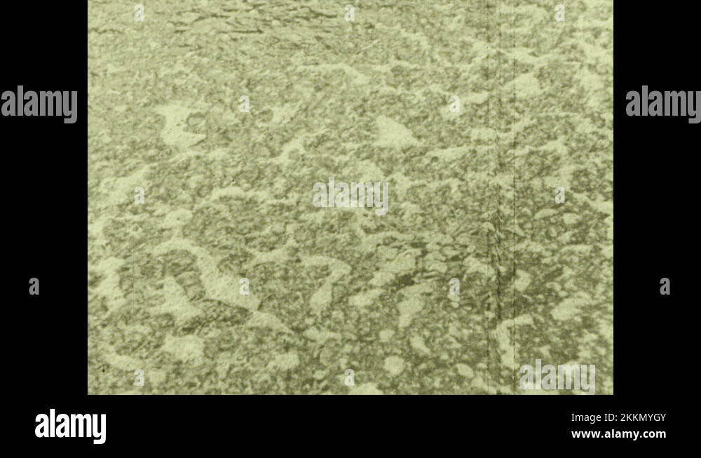 1930s Water in tank. Water bubbling. Animation of water filtering in