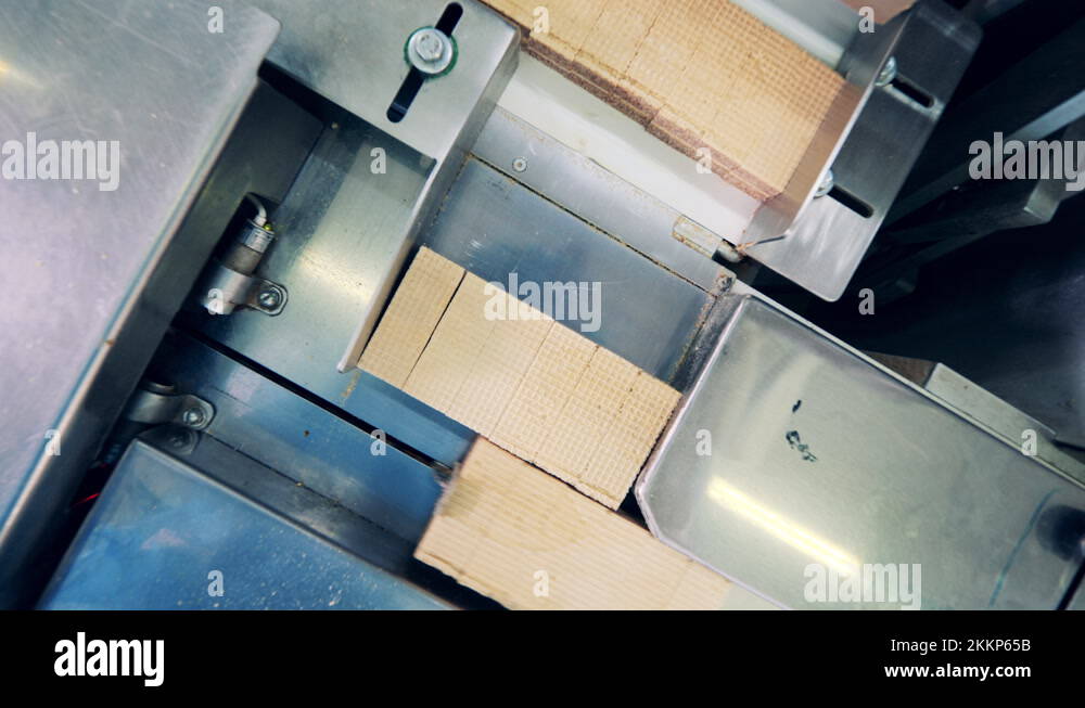 Automated transportation of waffle bars in a top view Stock Video Footage Alamy