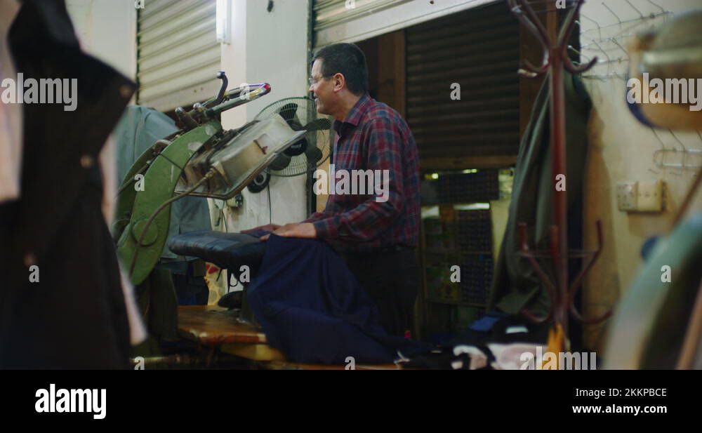 Traditional Steam Press Iron On Suit Jackets At The Grand Bazaar in
