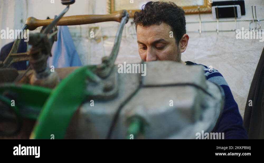 Traditional Steam Press Iron On Suit Jackets At The Grand Bazaar in