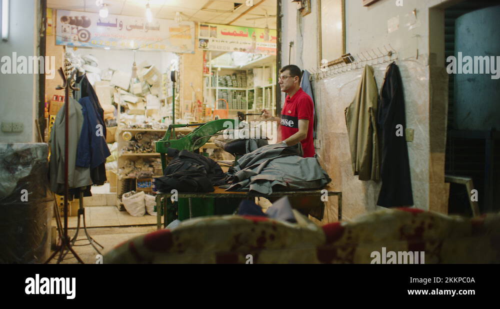 Traditional Steam Press Iron On Suit Jackets At The Grand Bazaar in