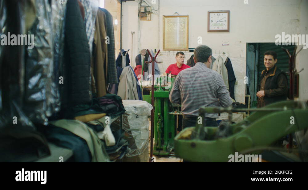 Traditional Steam Press Iron On Suit Jackets At The Grand Bazaar in