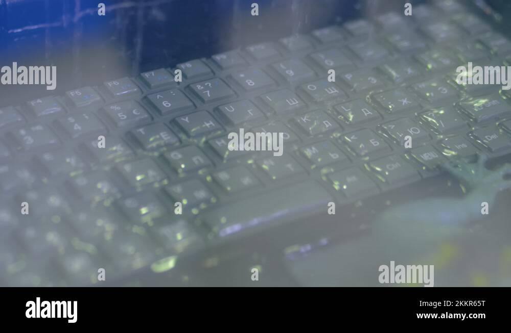Keyboard of rugged laptop computer during water resistance test close