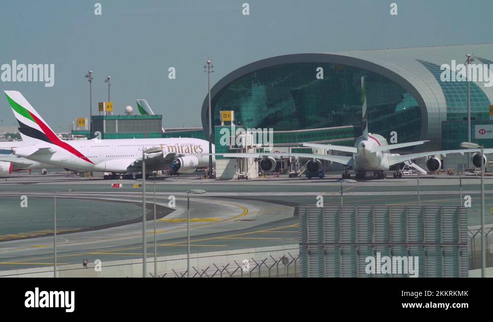 Emirates Airline Aircraft At Terminal 3 Gates Of Dubai Airport During