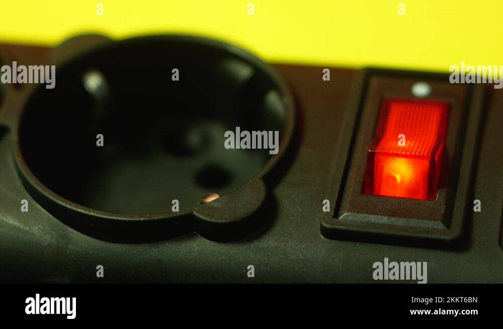Turning off the red button for turning on electrical appliances closeup. Finish Stock Video