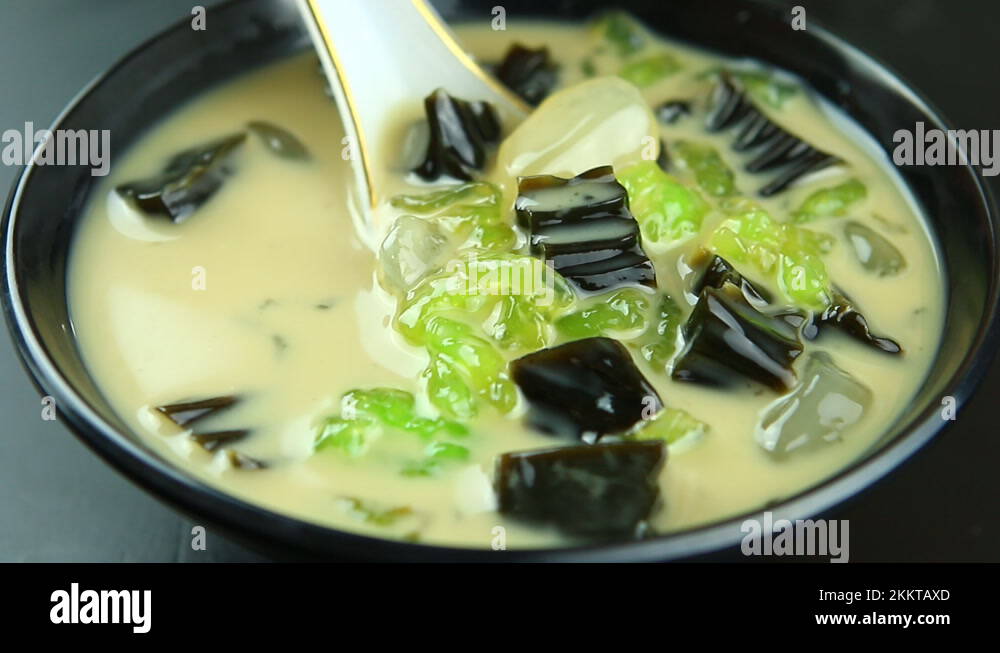 Thai mixed dessert in coconut milk, Thai famous dessert Stock Video