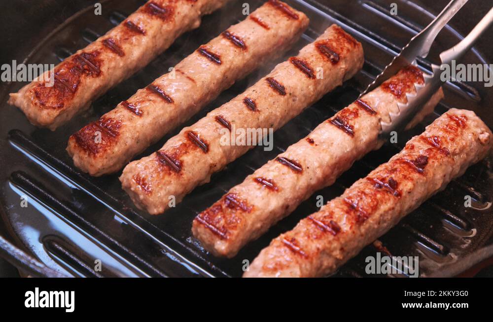 Meat kebabs frying in UHD Stock Video Footage Alamy