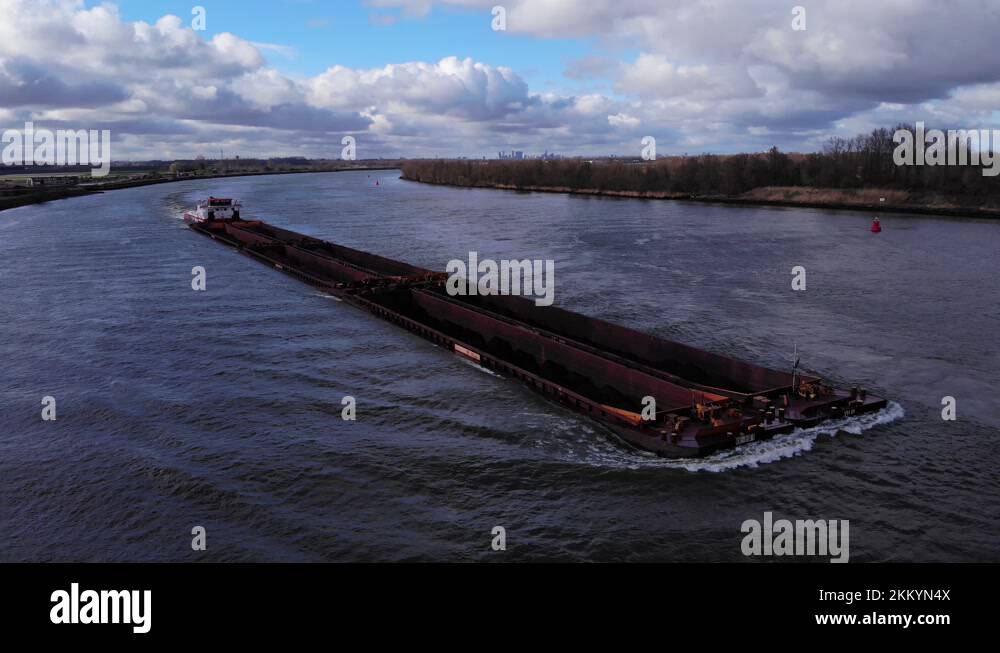 Multiple Cargo Dry Bulk Carrier Ship With Multiple Cargo Holds Traveling Across The ...