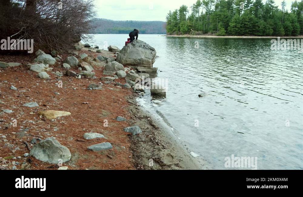 Boy climbing on a boulder Stock Videos & Footage HD and 4K Video