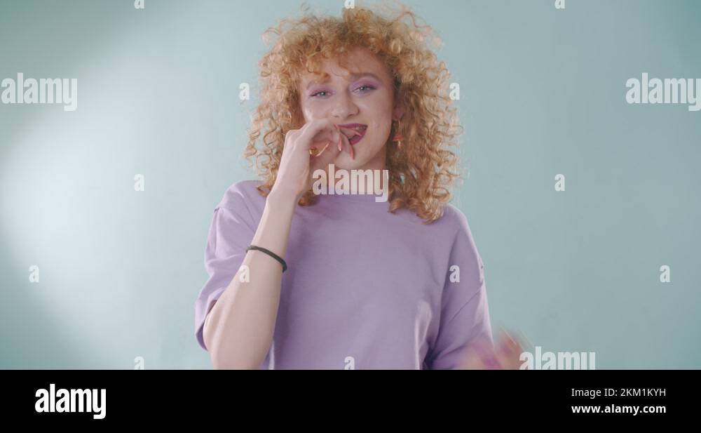 Stretching the gum from her mouth Stock Video Footage - Alamy