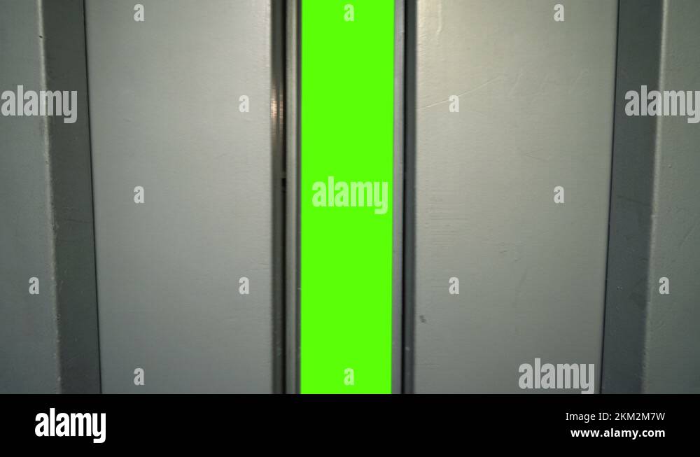 Closeup view of Old Elevator Open the Doors with Green Screen Stock Video Footage Alamy