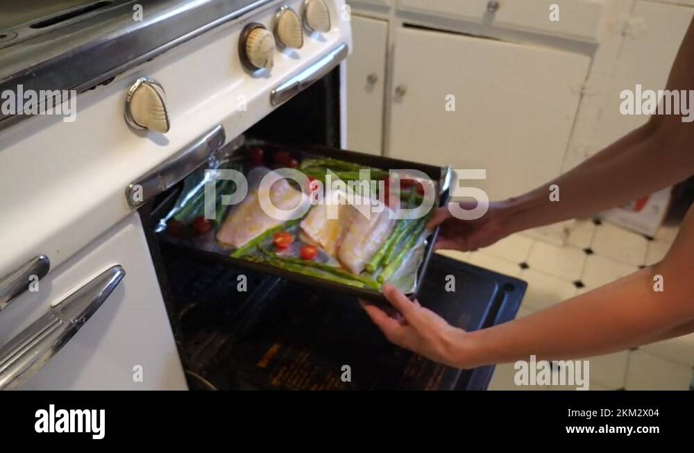 Cooking fish in oven Stock Videos & Footage HD and 4K Video Clips Alamy