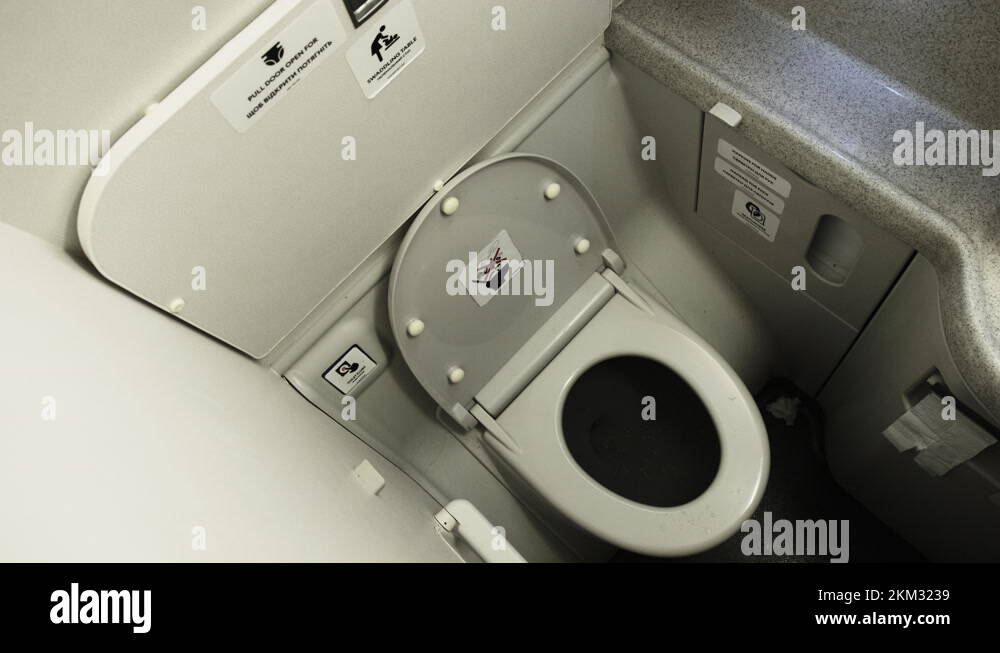Public Toilet in the Airplane, Airplane Bathroom. Inside a Toilet
