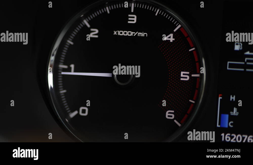 Close up dashboard of car speedometer. The engine is accelerating. Tachometer ne Stock Video