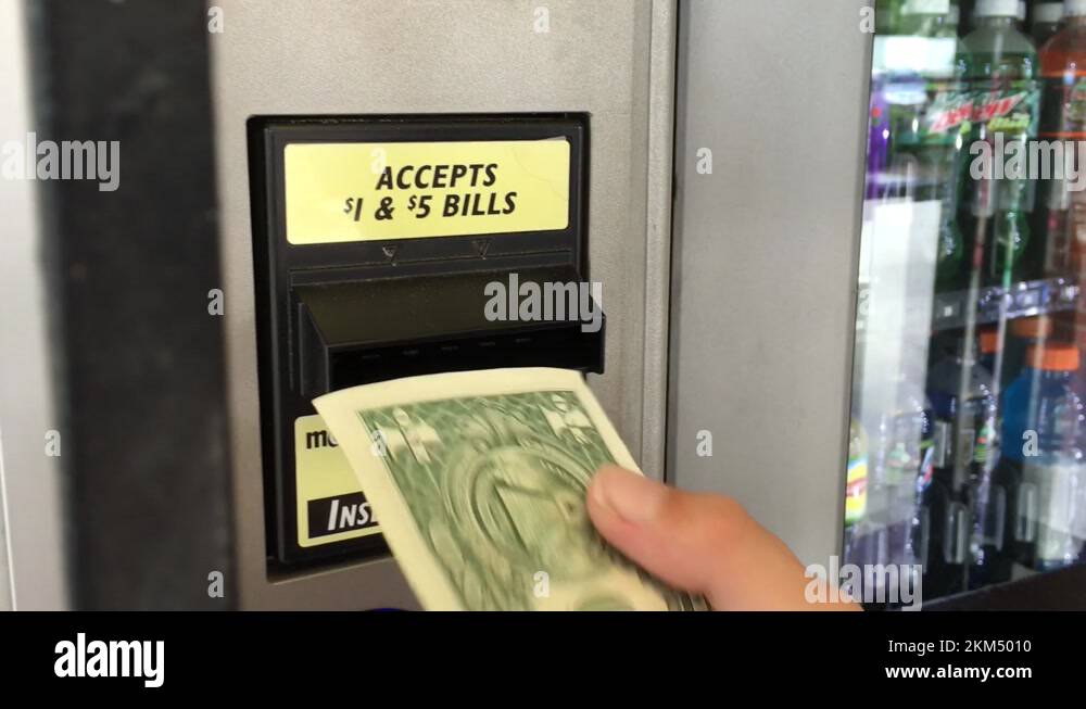 Paying For Items At A Vending Machine Stock Video Footage Alamy